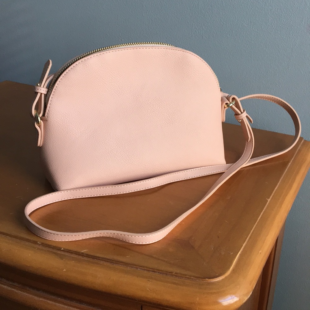 Light pink half moon shaped crossbody